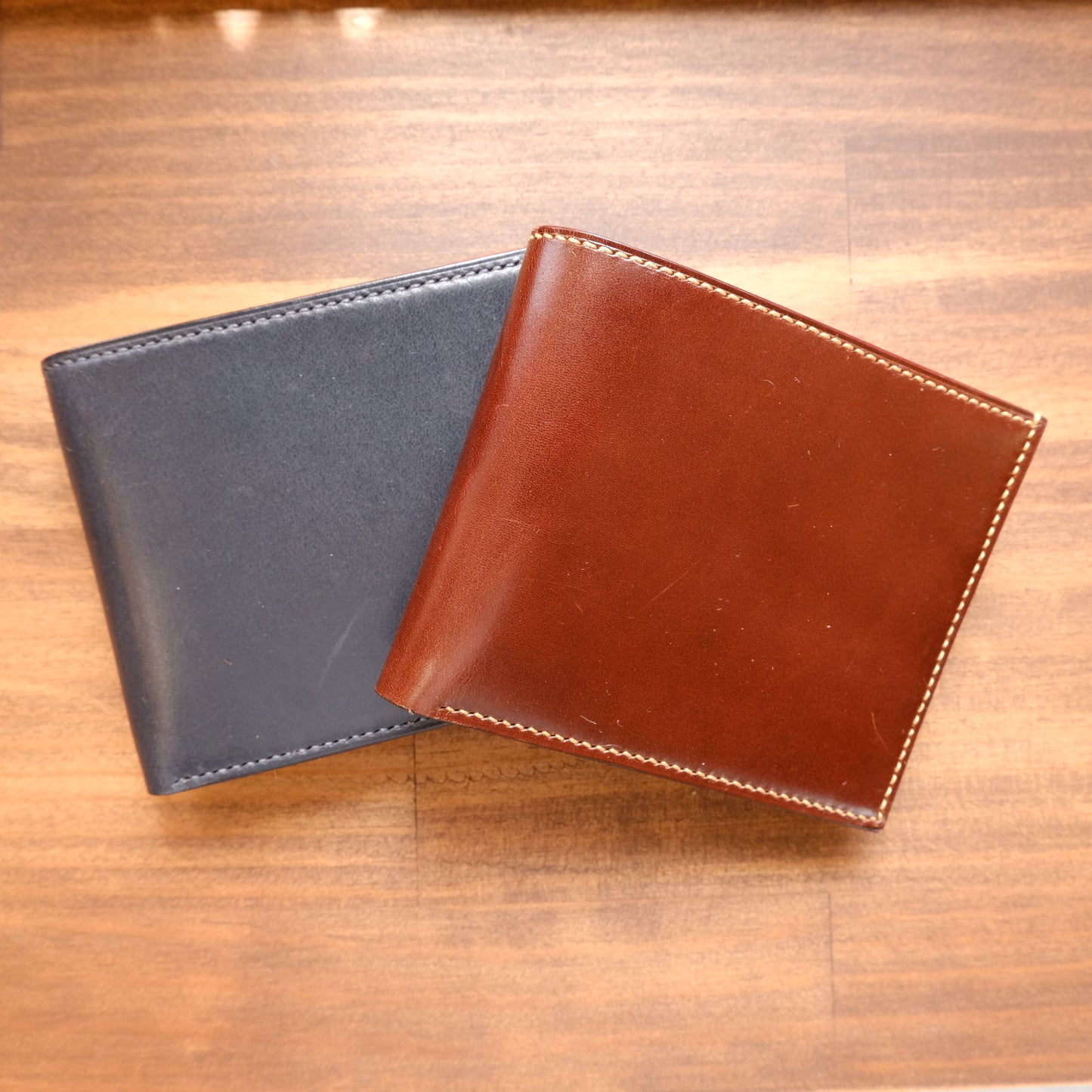 K.EZAWA 牛革二つ折り財布